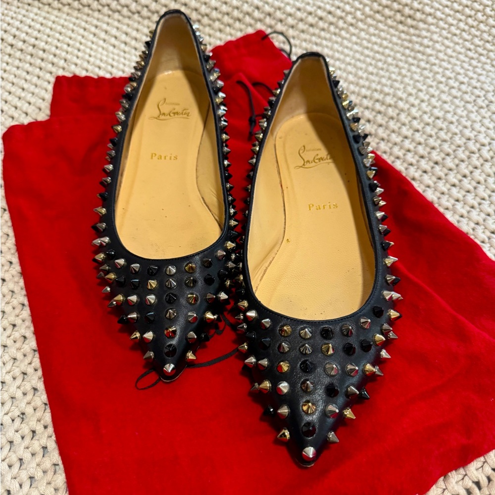 LouBoutin Spiked Leather Flats - Red Bottoms